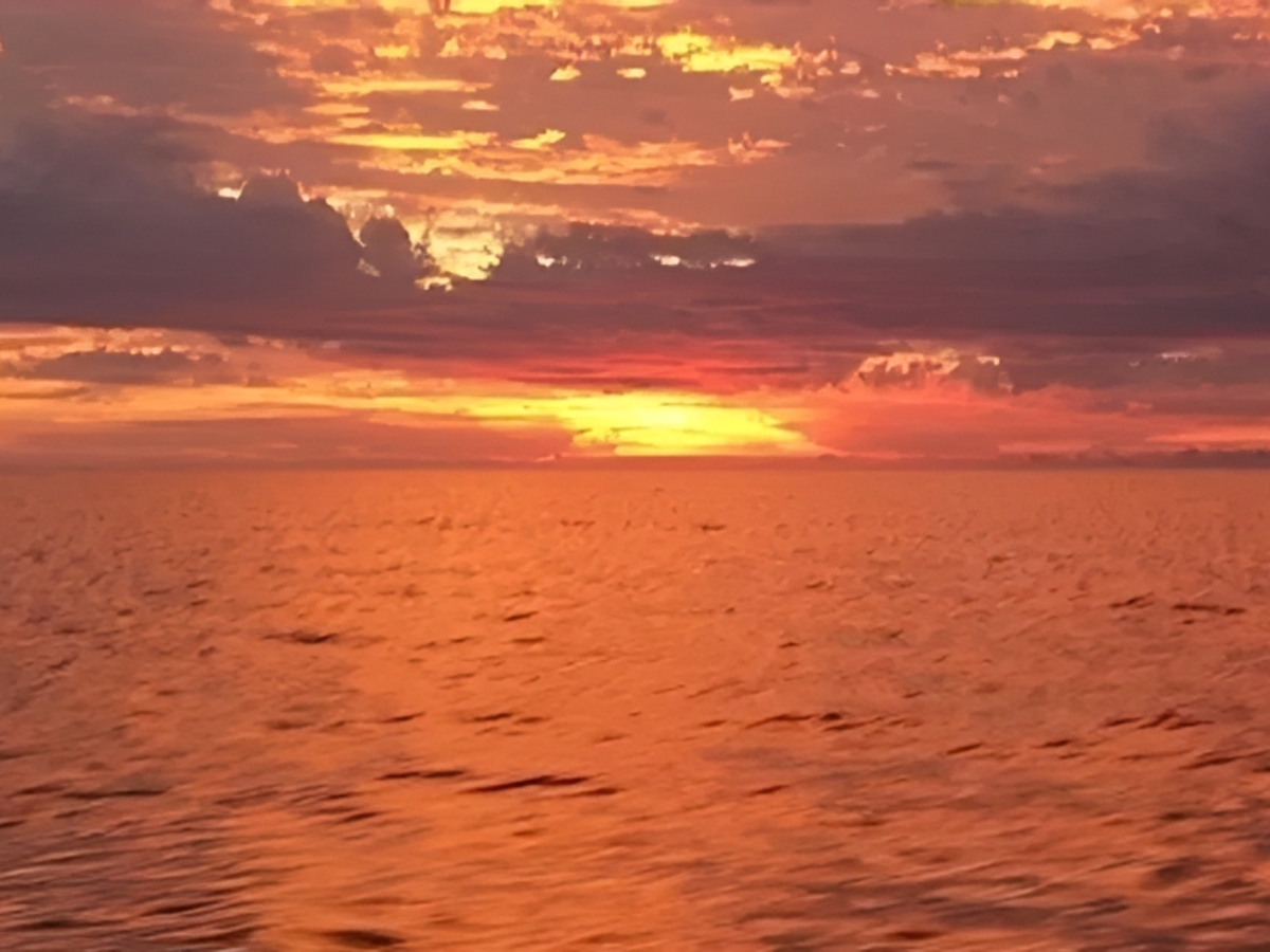 Vibrant orange sunset on the horizon