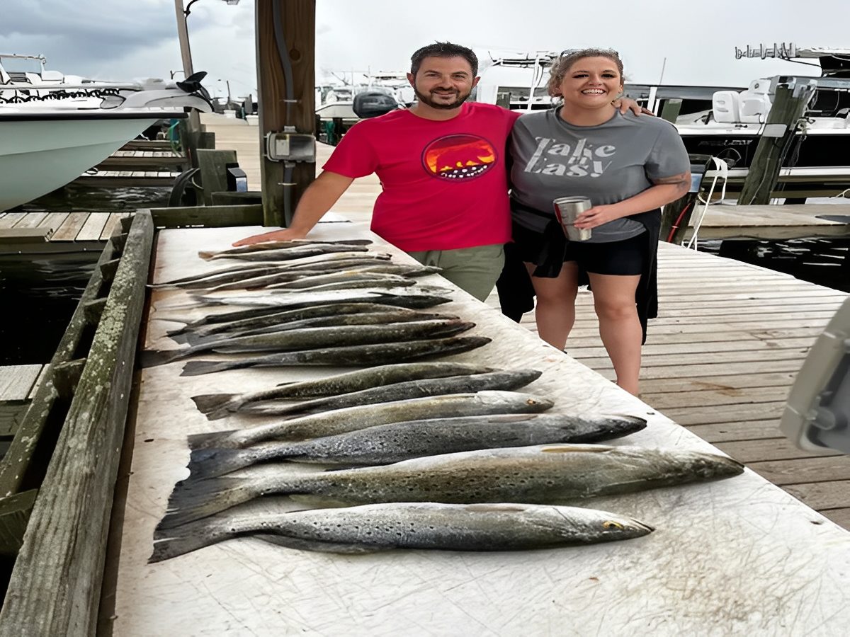 Fishermen showcasing their impressive catch