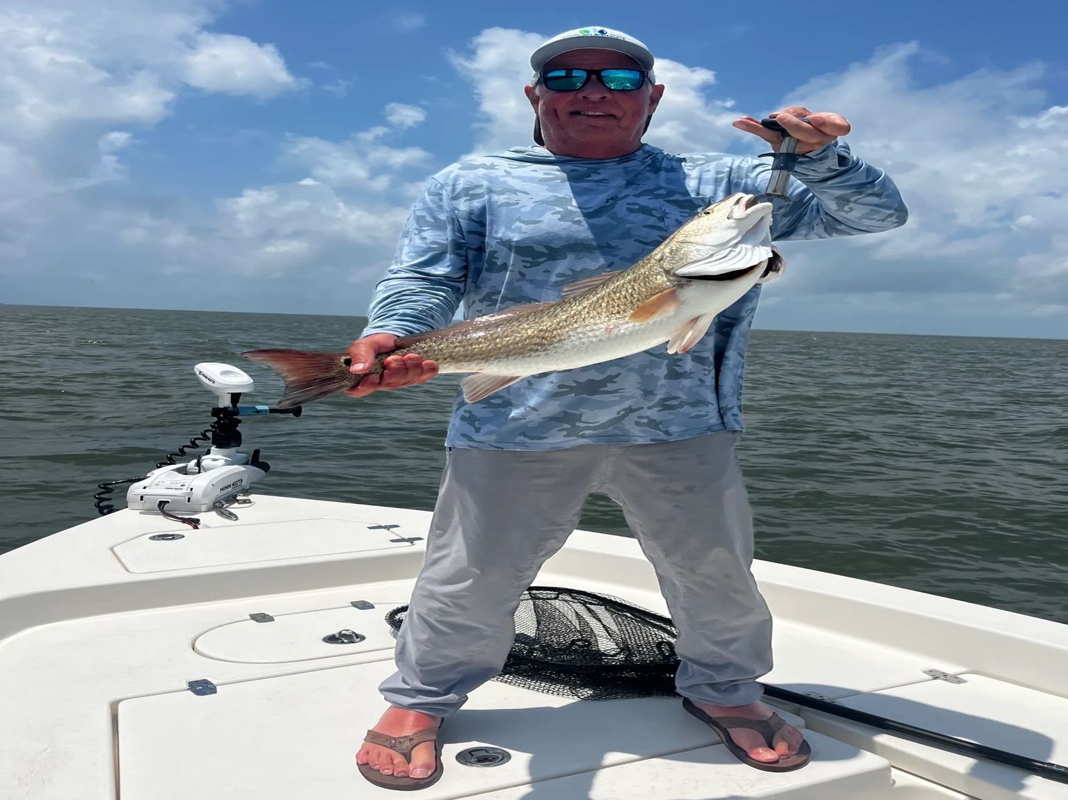 Fisherman displaying impressive catch