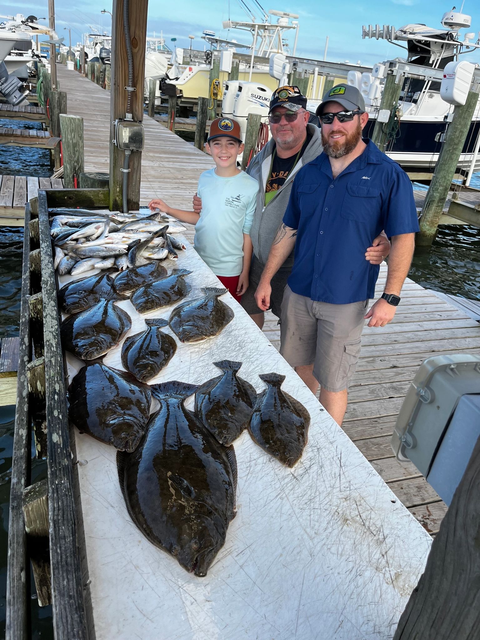 Family fishing trip success display